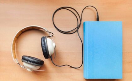 headphones and a book